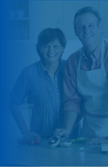 Man and woman cooking together in their kitchen