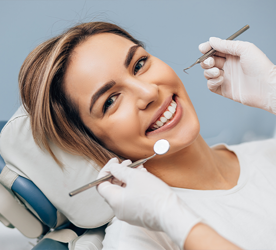 Woman smiling during dental checkup