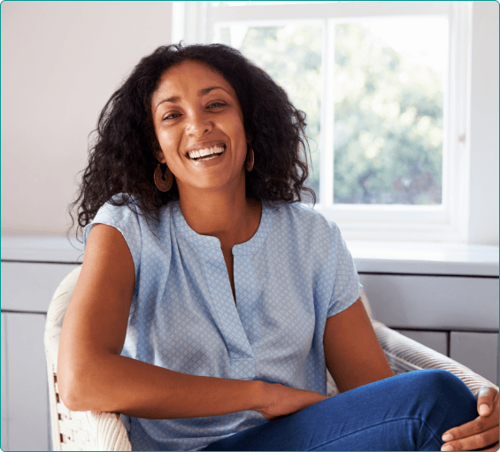 Woman smiling after restorative dentistry in Bangor
