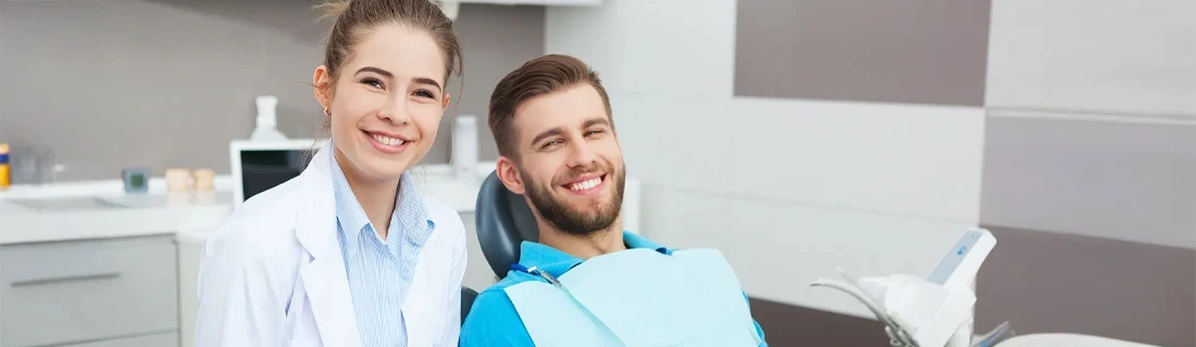 Dentist and Patient Smiling Frequently Asked Questions